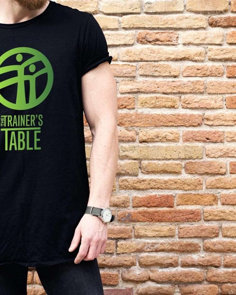 View of The Trainer's Table logo design on t shirt